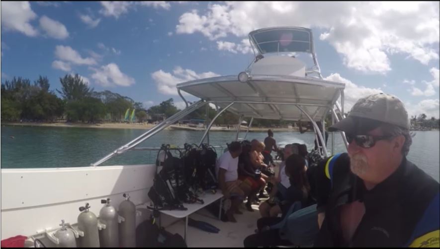 scuba divers on a dive boat